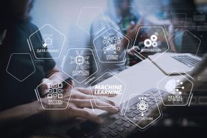 Graphics over keyboard denoting machine learning and AI tasks